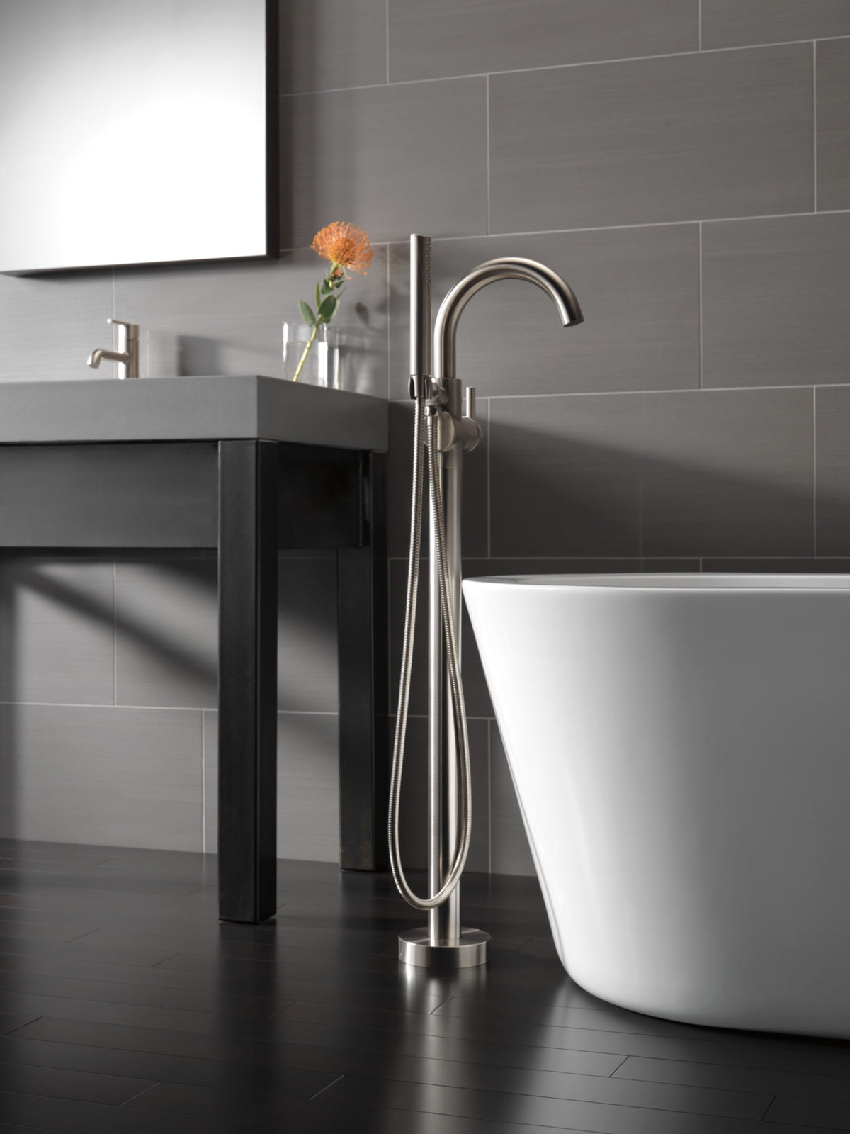 Delta Trinsic® Single Handle Floor Mount Tub Filler Trim with Handshower Stainless